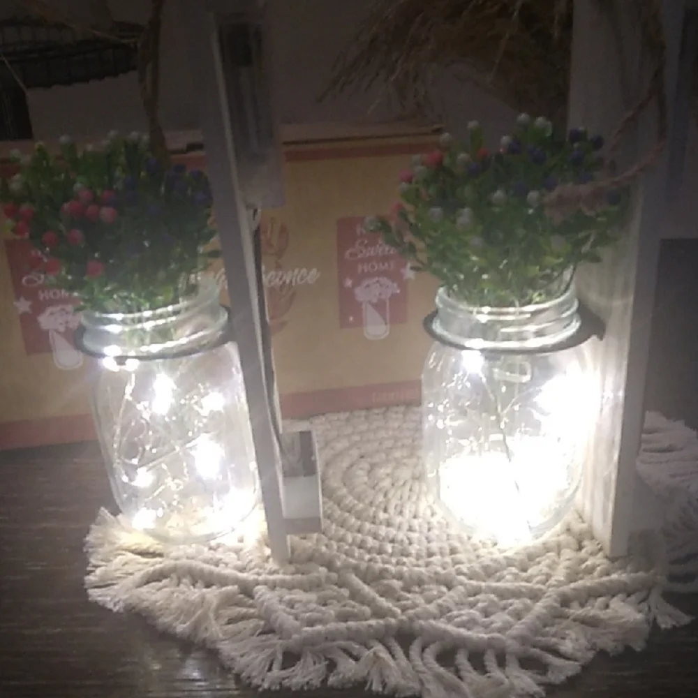 White Faux Floral Accents with Illuminated Glass Jars